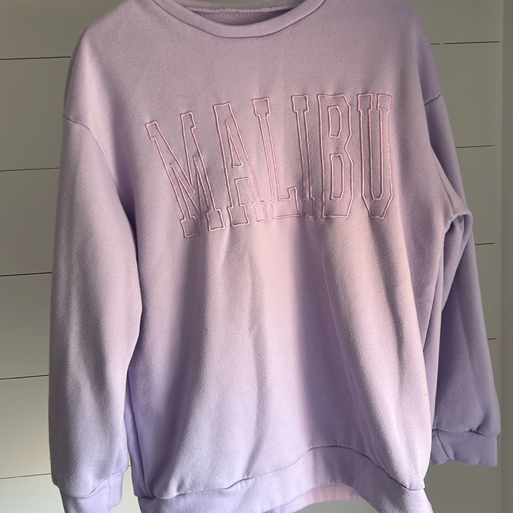 Purple SHEIN crew neck.